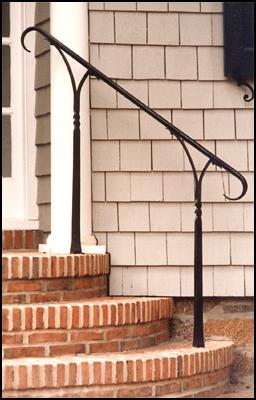rail on brick steps photo